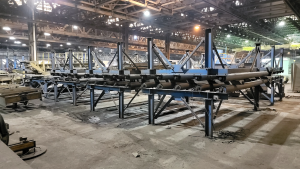 BCP Blast Cleaning Products 9 Wheel Autoblast Machine with Paint/Cure Roll Line – Year 2002