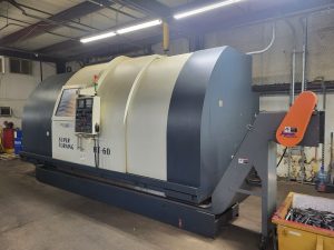 JOHNFORD HT 60 CNC Horizontal Slant Bed Turning Center with Dual Turret – Year 2004