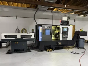Doosan Lynx 2100LSYB CNC Turning Center with LNS Alpha SL65-S Servo Bar Feed – Year 2021