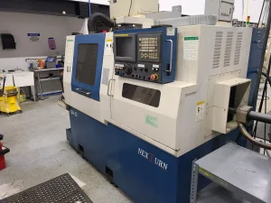Nexturn SA32 CNC Swiss Lathe 32mm with IEMCA Bar Feeder – Year 2004