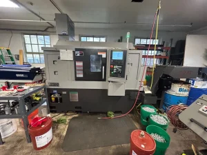 Tsugami M08SY-II CNC Turning Center with EDGE Technologies Rebel V-65 Servo Bar Feeder – Year 2023