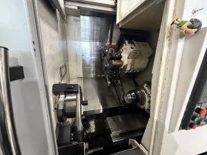 Okuma GENOS L300-M-e CNC Turning Center with Edge Technologies Rebel V-80 Bar Feeder – Year 2020