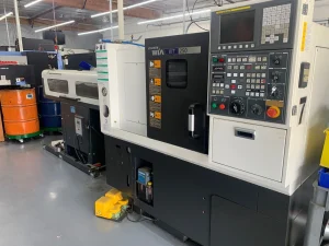 HYUNDAI WIA KIT250 CNC Lathe with LNS QUICK Load Servo 80 S2 Bar Feeder – Year 2014