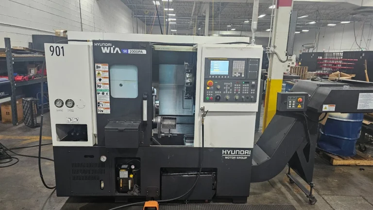 From Inspection to Installation: What to Verify Before Buying a Pre-Owned, Used, Secondhand, Surplus Hyundai Wia SE2000PA CNC Lathe with EDGE Technologies Rebel V-65 Servo Bar Feeder/Loader + Parts Catcher made in South Korea