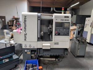 Nakamura-Tome AS-200 CNC Lathe with LNS Quick Load Servo Bar feeder – Year 2014