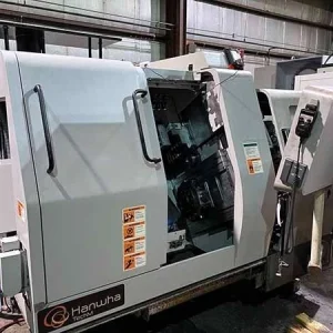 Hanwha STL 32H CNC Swiss Lathe with FMB TURBO 3-36 Bar Loader - Year 2012