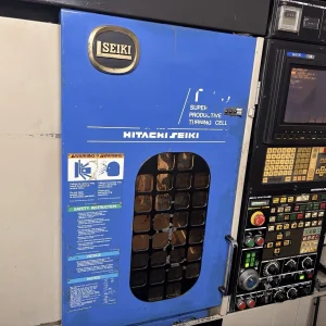 Hitachi Seiki TF20 CNC Lathe With MR6 Robot Loader and Turnover Station - Year 1995