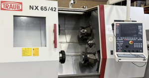 Traub TNX65/42 CNC Turning Milling Center 4 Turrets 2 Spindles with FMB Turbo 5-55 Magazine Type Bar Feeder – Year 2007