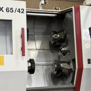 Traub TNX65/42 CNC Turning Milling Center 4 Turrets 2 Spindles with FMB Turbo 5-55 Magazine Type Bar Feeder - Year 2007