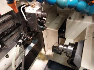 Tsugami B00 7B-II CNC Swiss Lathe with Spego Hydraulic Bar feeder – Year 2006