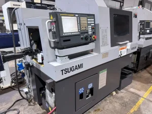 Tsugami S206 CNC Swiss Lathe with Edge Minuteman 320 SE Bar Feeder – Year 2012